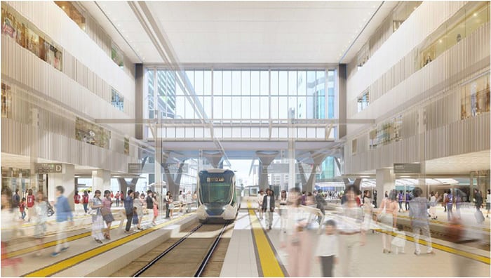 A tram arriving at the 2nd floor plaza