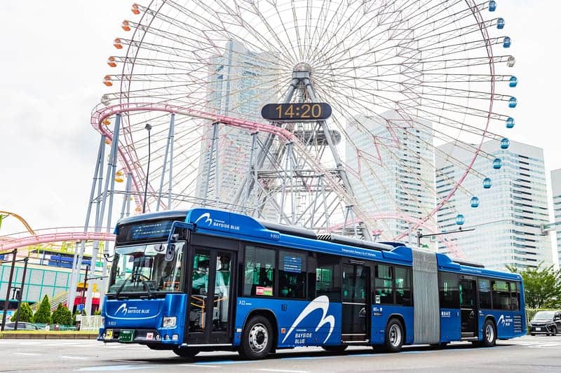 The Bayside Blue bus at Cosmo Clock 21 Ferris wheel