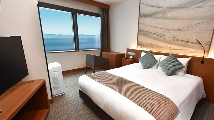 A standard double room at Odysis Suites Osaka Aiport Hotel