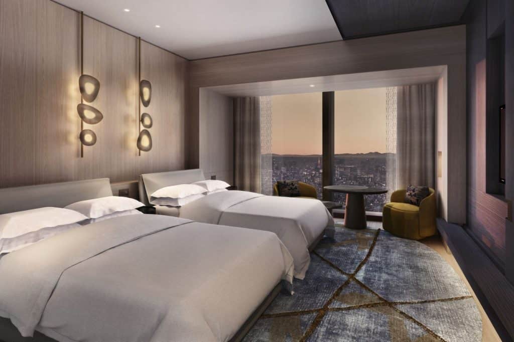 A Deluxe Twin guest room