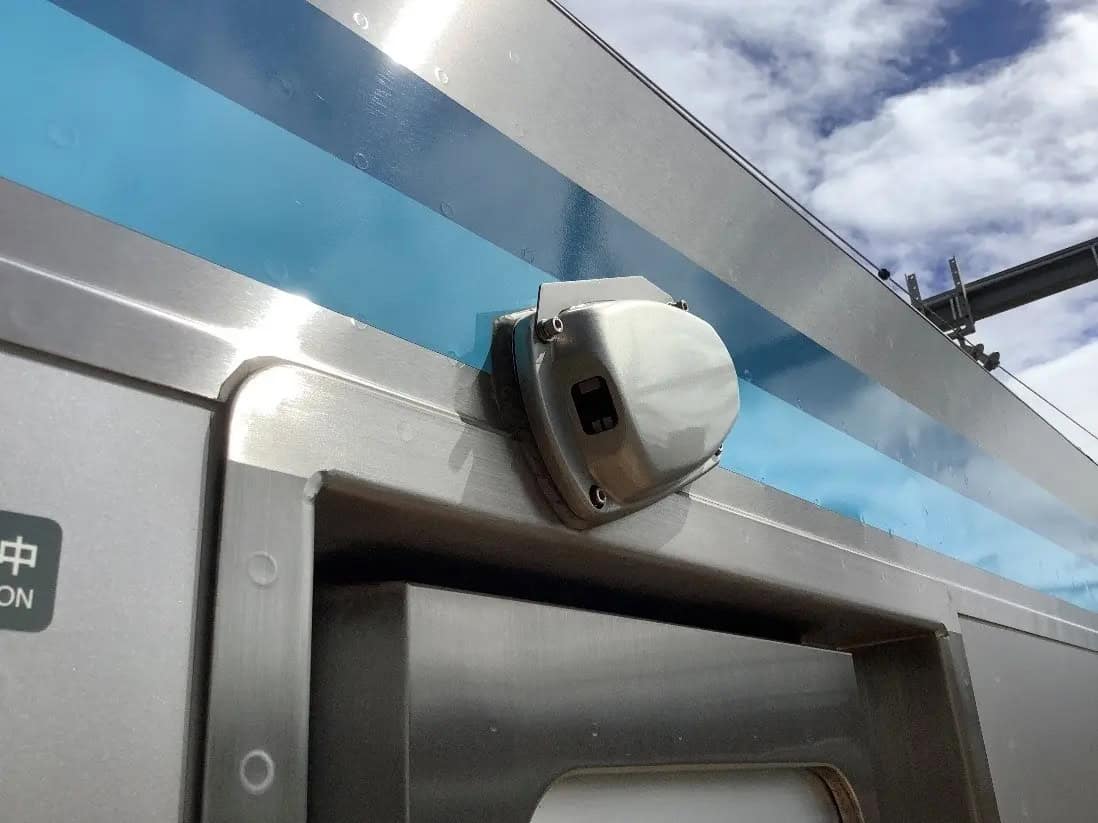 A camera on the side of a train